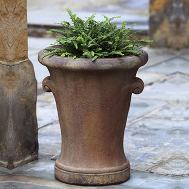 Monterey Planter on floor filled with plants