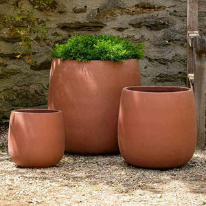 Potrero Planter - Terra Rosa - S/3 filled with plants in the backyard