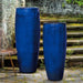 Sabine Planter - Sapphire S/1 beside a steel chair near concrete stairs