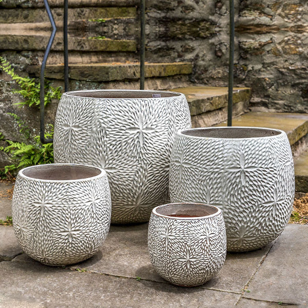 Sand Dollar Planter - Cream - S/4 on concrete near stairs