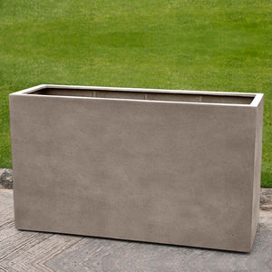 Sandal Planter 591836 - Riverstone Premium Lite - S/1 on concrete in the backyard