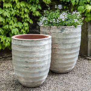 Sistina Planter - Vicolo Terra Set of 2 filled with flowers in the backyard
