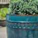 Tall Borsa Planter - Indigo Rain - S/4 filled with plants in the backyard upclose